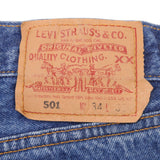 Beautiful Indigo Levis 501 Jeans 1990s Made in USA with Medium Dark Wash   Size on tag 34X32  Back Button #532