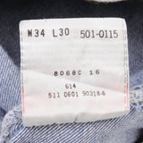 Beautiful Indigo Levis 501 Jeans 1990s Made in USA with Medium Light Wash With Light Whiskers   Size on tag 34X30   Back Button #511