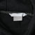 Close-up of interior Nike care label beneath white neck tag