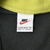 Nike neck tag marked XL (16–18) to EG and Made in Indonesia