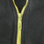 Close-up of lime quarter zipper and pull on dark green Nike sweatshirt