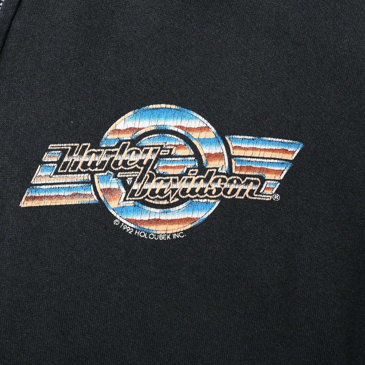 Blue, orange and white Harley-Davidson chest logo print on black fabric