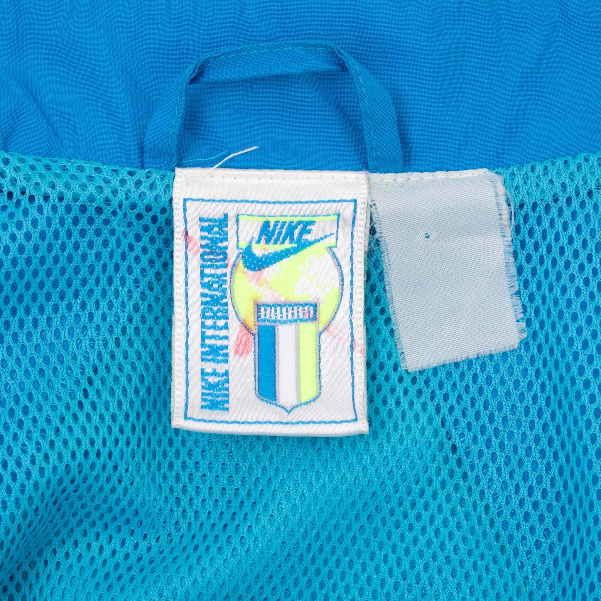 Vintage Nike International All Over Print Blue Windbreaker Jacket 1990S Size Medium