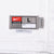 Close-up of Nike Team size large jock tag with Length +2 label on white jersey fabric