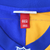 Jersey neck size tag marked 44 (L) above embroidered NFL shield
