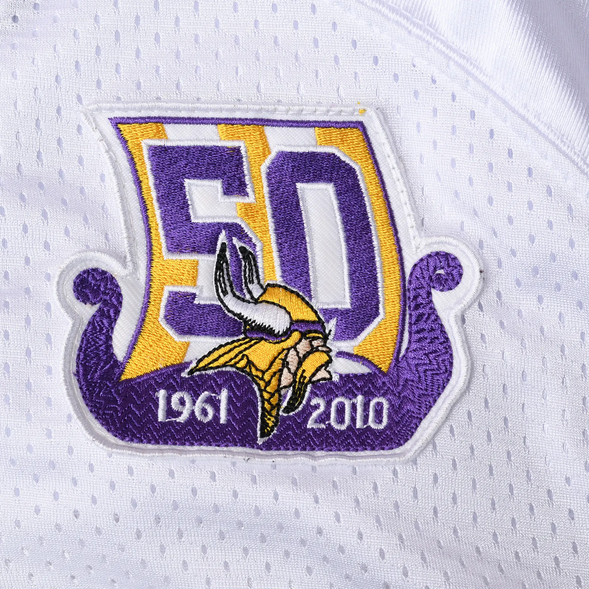 Close-up of Minnesota Vikings 50th anniversary embroidered patch marked 1961–2010