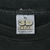 Close-up of XL 3D Emblem Fort Worth, Texas, Made in USA neck tag