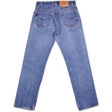 Beautiful Indigo Levis 501 Jeans 1985-1988 Made in USA with a medium blue wash and a nice contrast between light and medium blue.  Size on Tag 29X30  ACTUAL SIZE 29X29  Back Button #653