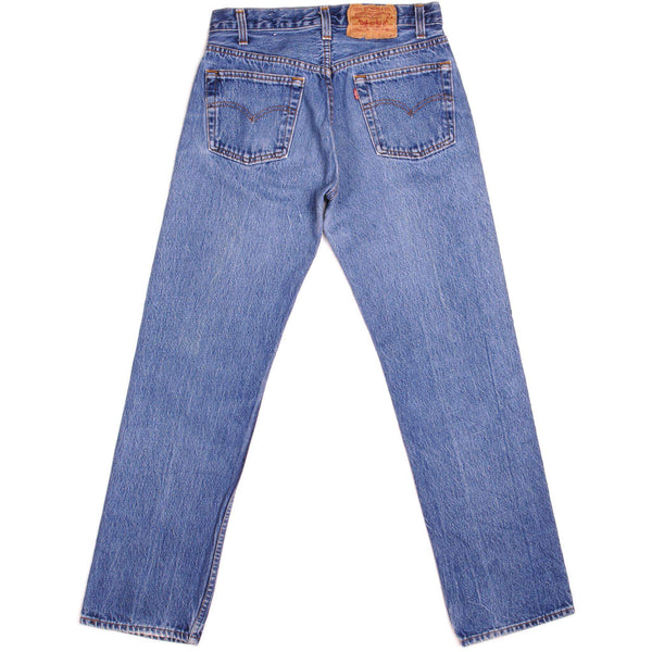 Beautiful Indigo Levis 501 Jeans 1985-1988 Made in USA with a medium blue wash and a nice contrast between light and medium blue.  Size on Tag 29X30  ACTUAL SIZE 29X29  Back Button #653