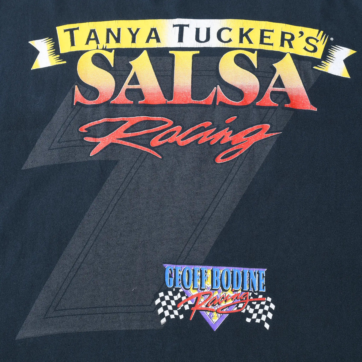 Back print close-up showing Tanya Tucker's Salsa Racing and George Boudine Racing logos