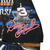 Close-up of sleeve print with No. 3, The Intimidator text, and Dale Earnhardt signature