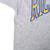 Close-up of small flaw marked by an arrow near the Richland front graphic