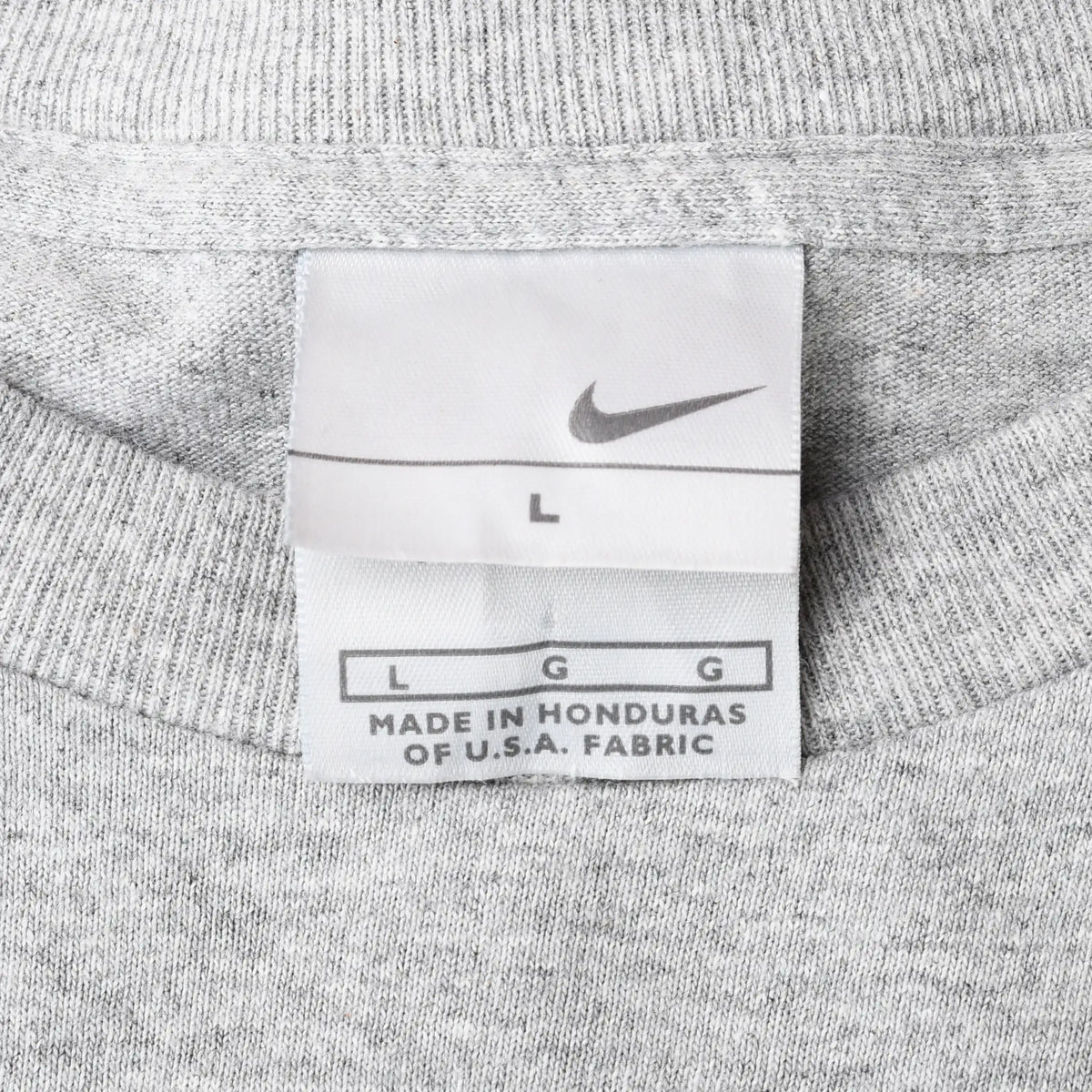 Nike neck tag marked L and Made in Honduras of U.S.A. fabric