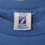 Close-up of Logo 7 neck tag inside blue Seattle Seahawks T-shirt