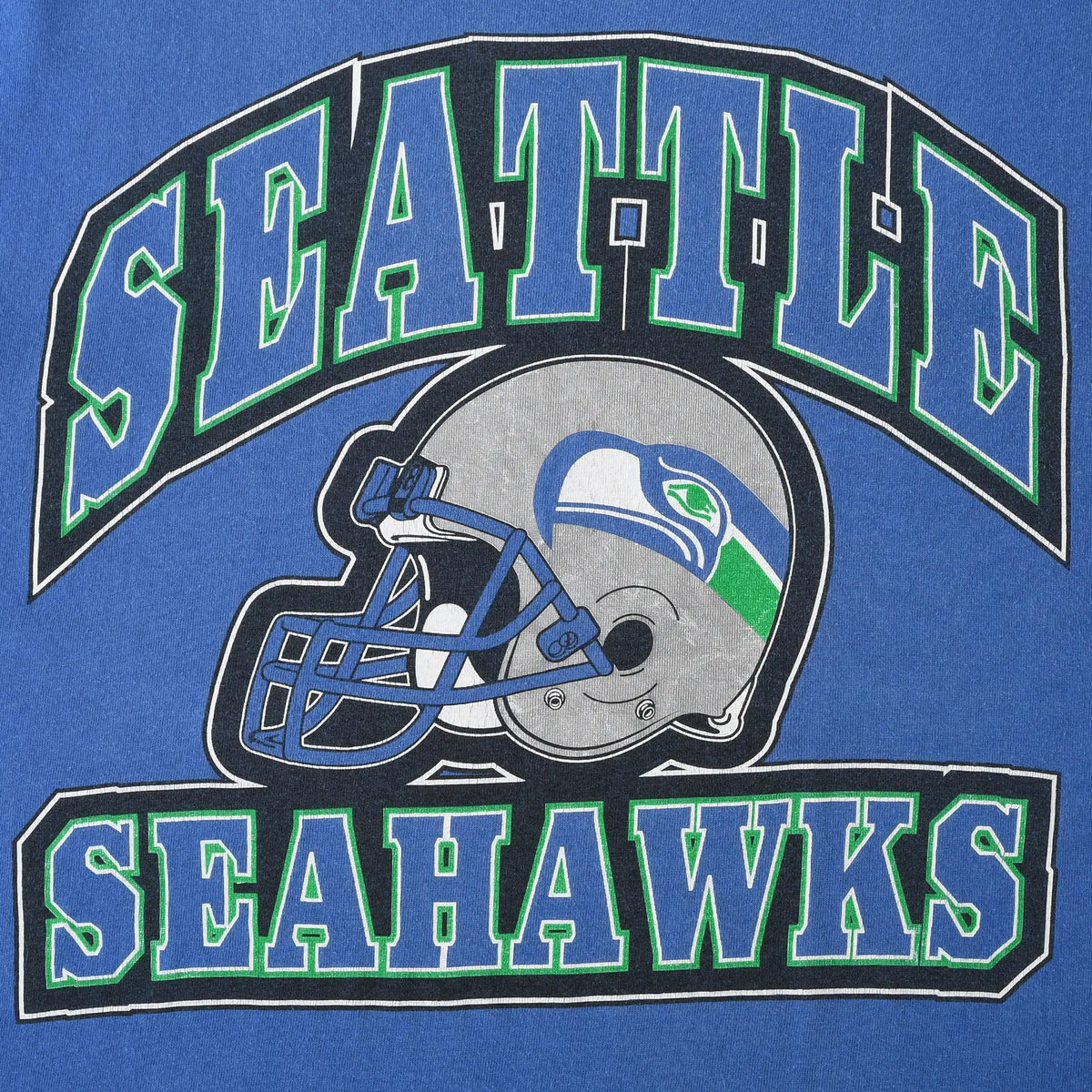 Close-up of Seattle Seahawks name and football helmet front print