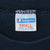 Champion Small neck tag with care instructions inside navy T-shirt