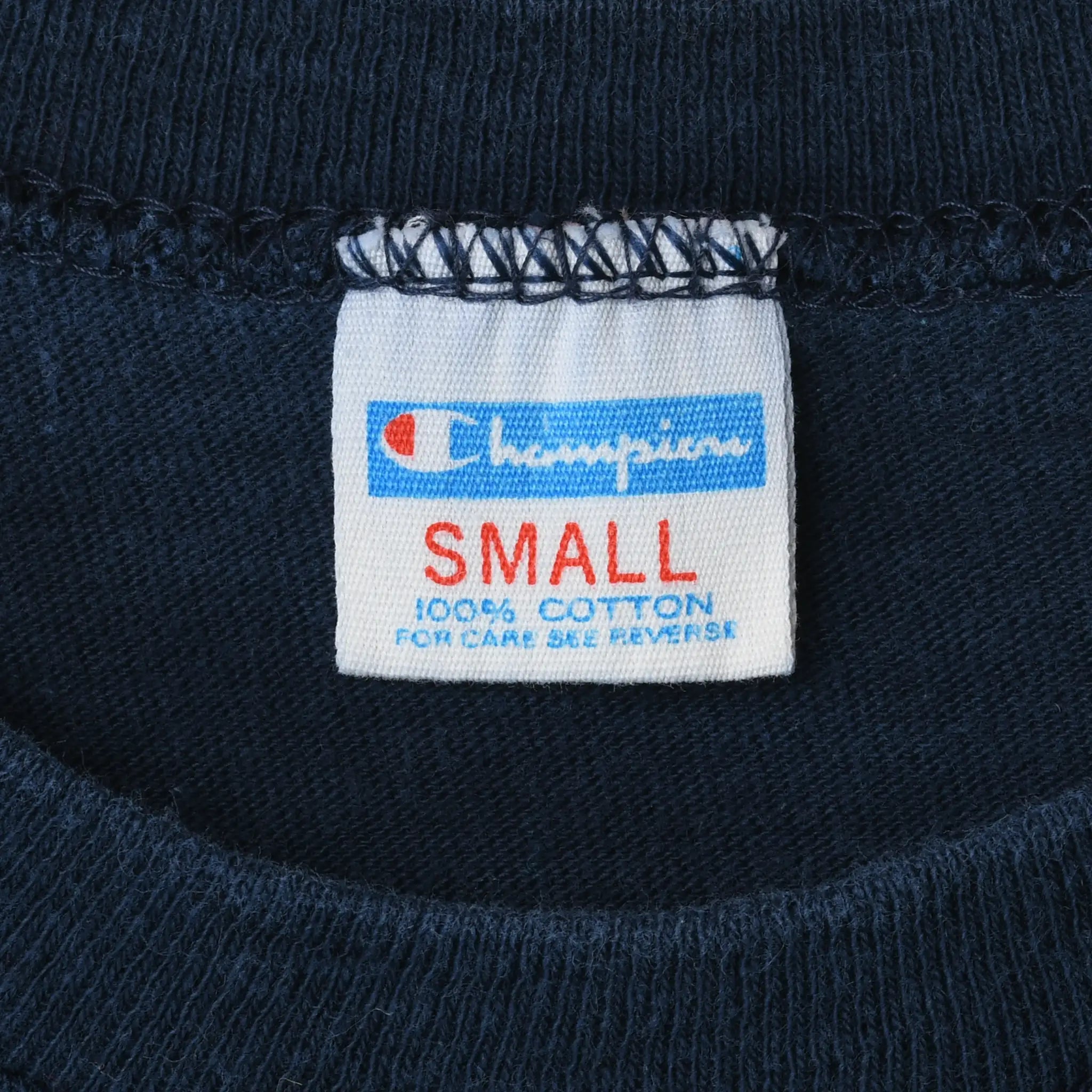 Champion Small neck tag with care instructions inside navy T-shirt