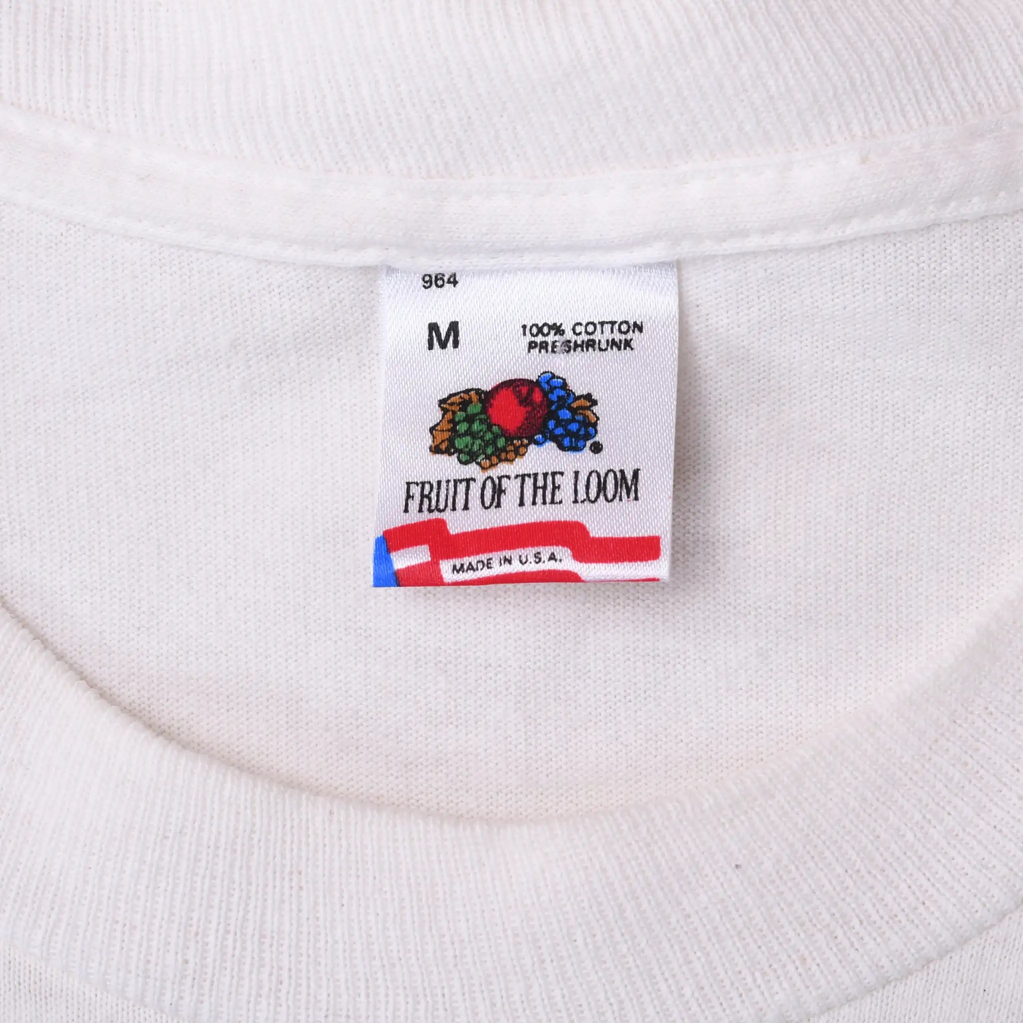 Fruit of the Loom size M neck tag on white T-shirt