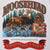 Close-up of Moosehead Canadian Lager print with moose, forest, label, and red banner