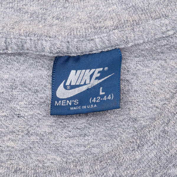 Vintage Nike Swoosh Grey Tee Shirt 1980S Medium Made In USA With Single Stitch Sleeves

Blue Label