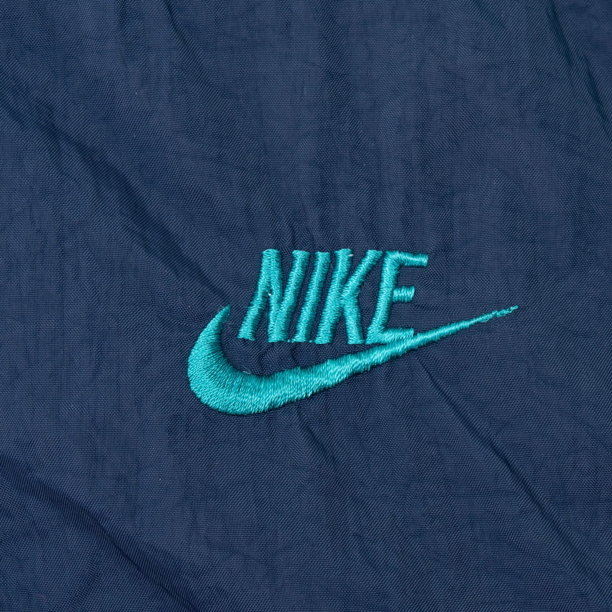 VINTAGE NIKE CLASSIC SWOOSH BLUE TEAL WINDBREAKER JACKET EARLY 1990S LARGE