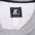 Starter neck label and X-Large care tag inside gray sweatshirt