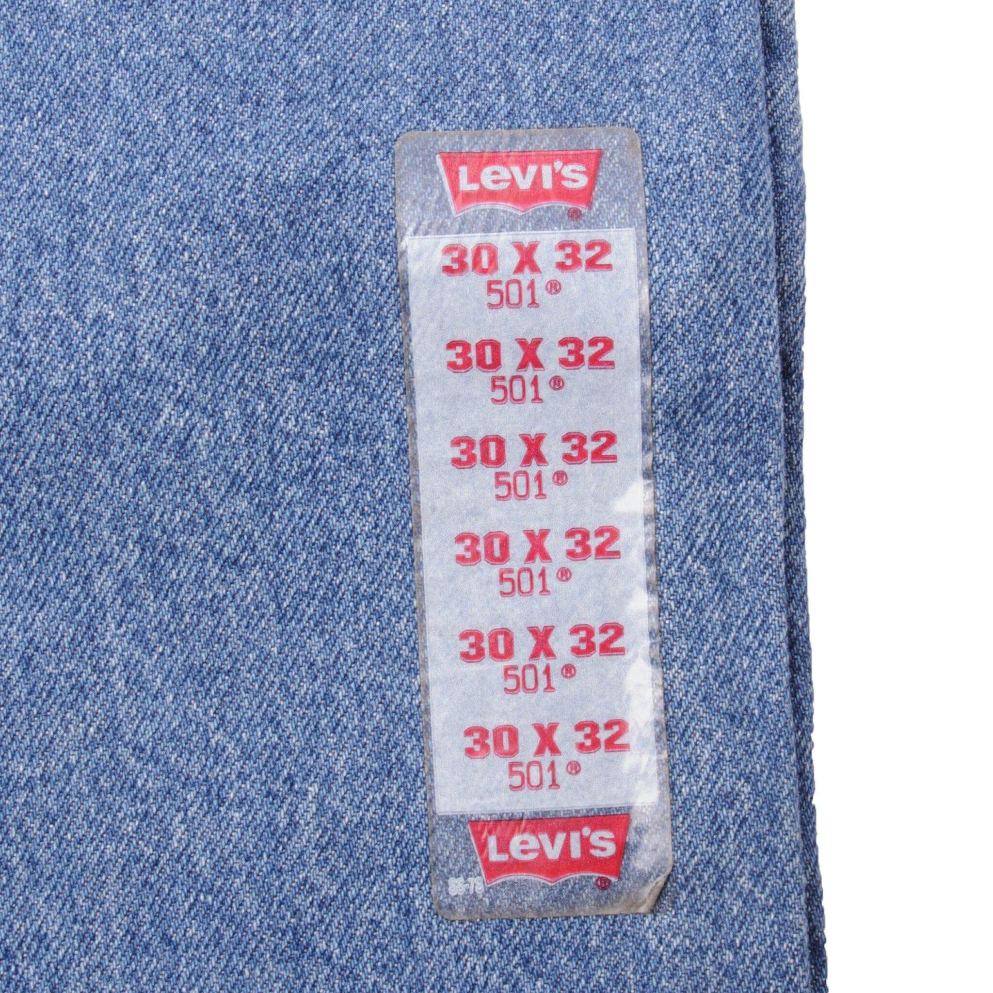 Beautiful Indigo Levis 501 Jeans 1990's Made in USA.  Size on Tag 30X32 Back Button #913