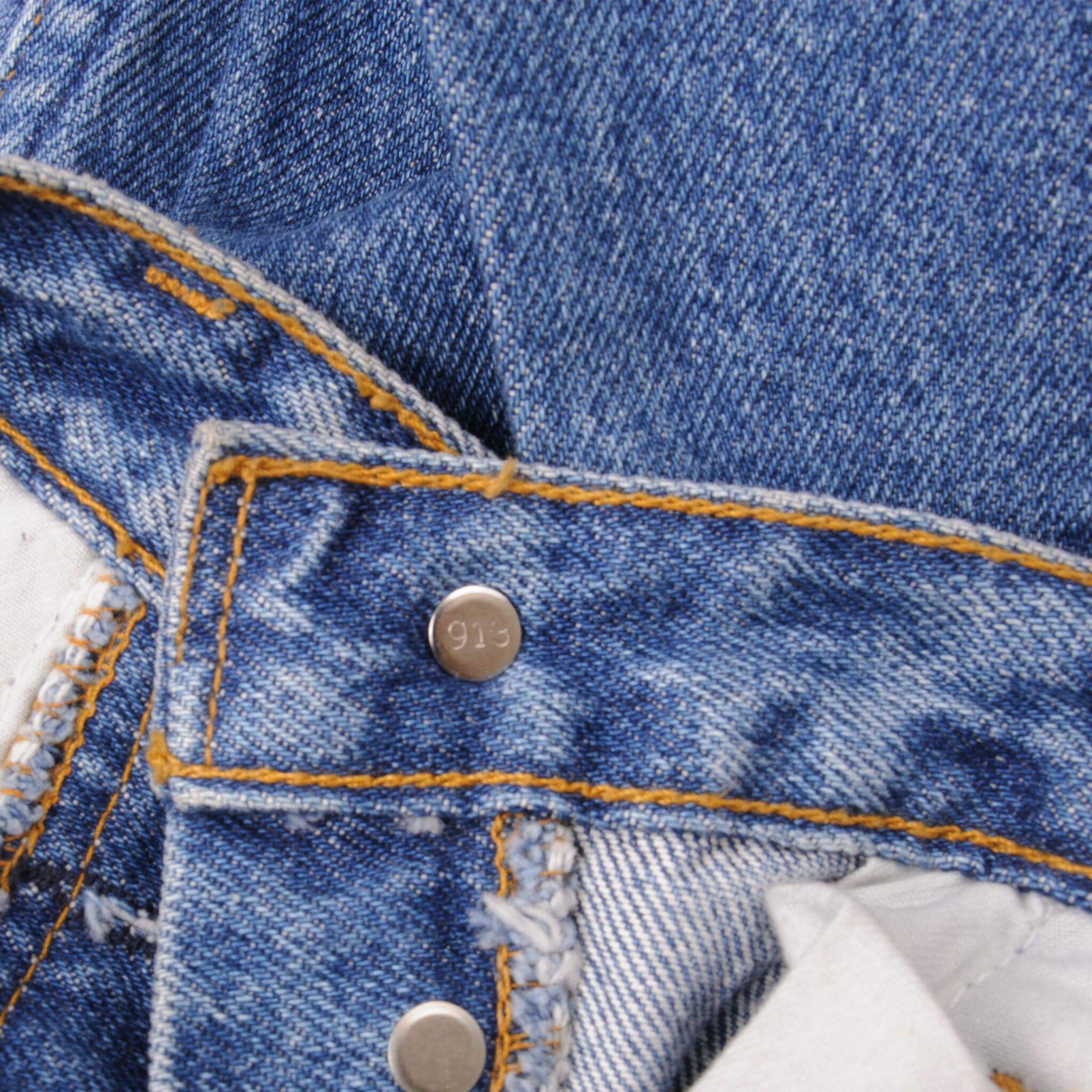 Beautiful Indigo Levis 501 Jeans 1990's Made in USA.  Size on Tag 30X32 Back Button #913