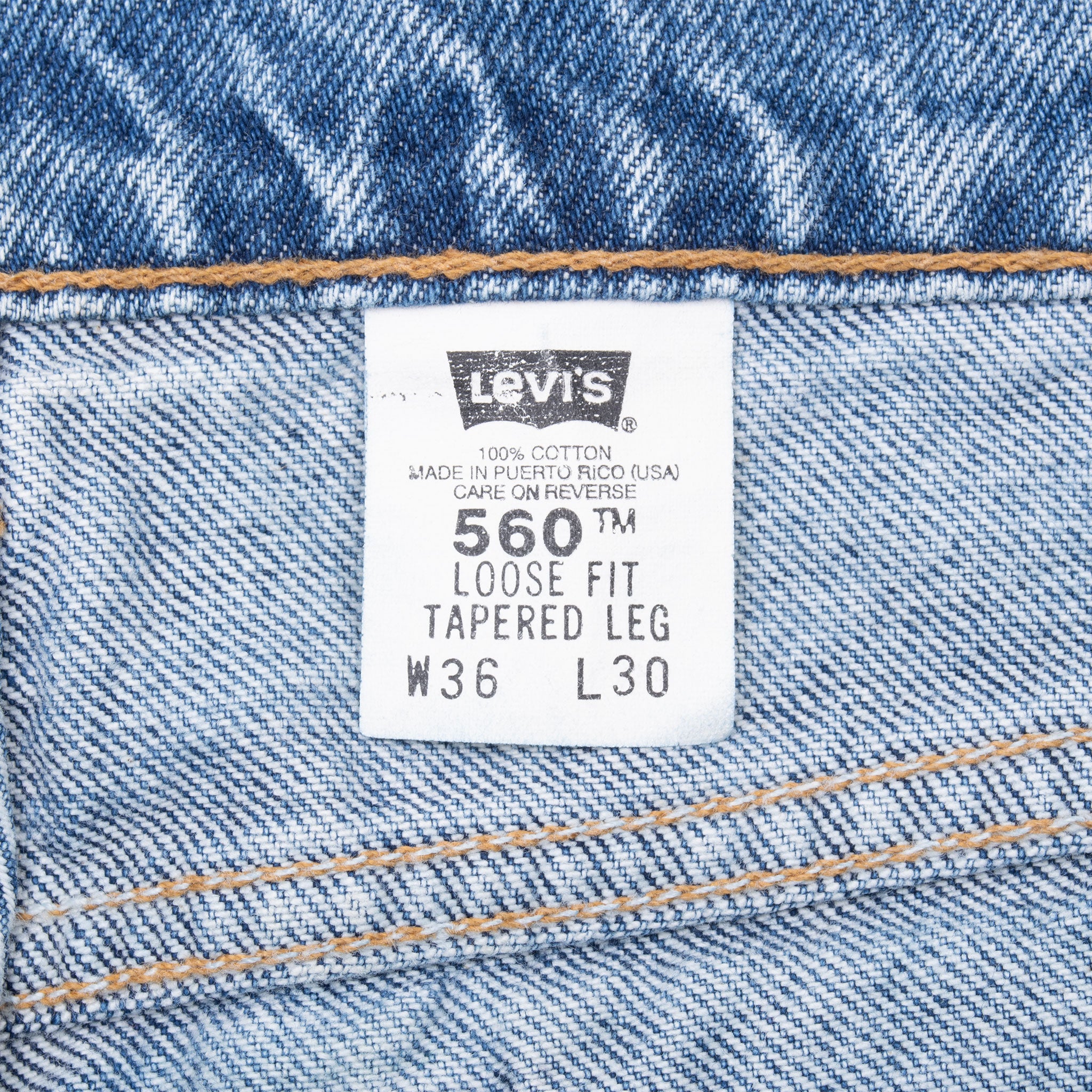 Vintage Levis 560 Loose Fit Tapered Leg Orange Tab Indigo Blue Jeans 1980S Size 34X29 Made In Usa With A Medium Wash

Size On Tag 36X30 Actual Size 34X29

Back Button #918