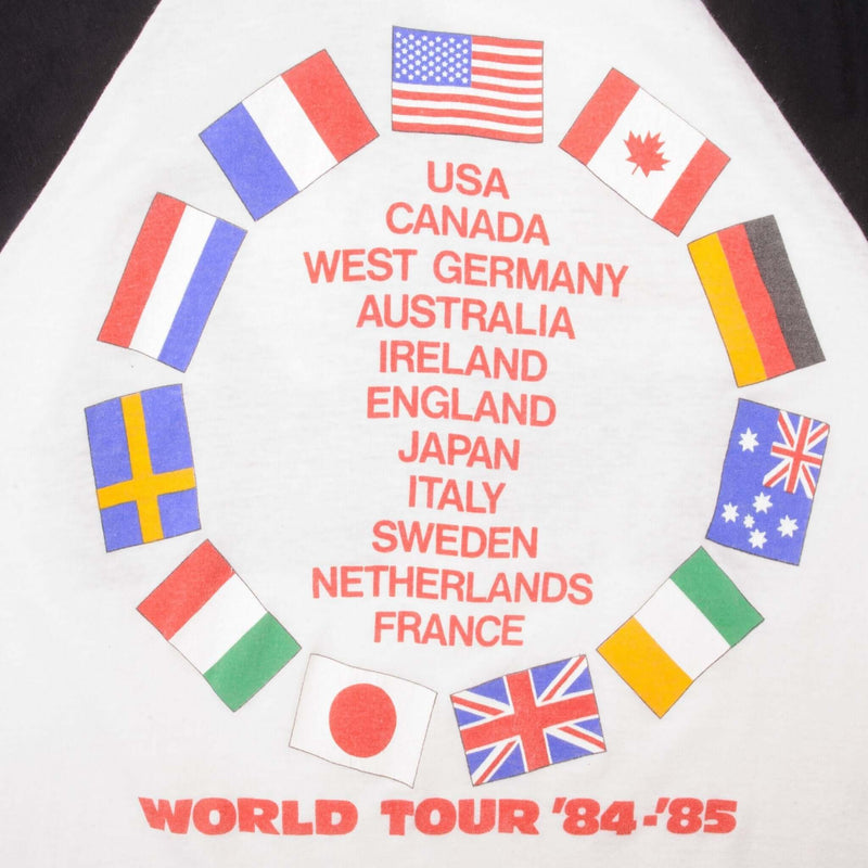 Vintage Bruce Springsteen And The E Street Band World Tour '84/85 Signal Raglan Tee Shirt 1984 Size Large (fits like a Small) Made In USA with single stitch sleeves.