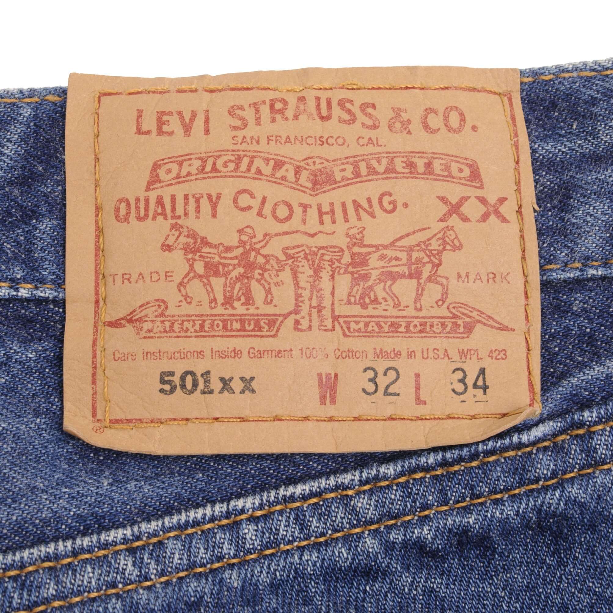 Beautiful Indigo Levis 501 Jeans 1990S Made in USA with dark wash with light whiskers  Size on Tag 32X34 Actual Size 32X32 Back Button #653