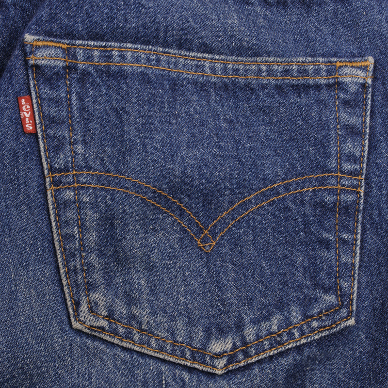 Beautiful Indigo Levis 501 Jeans Made in USA with dark wash with light whiskers  Size on Tag 32X34 Actual Size 32X32 Back Button #653