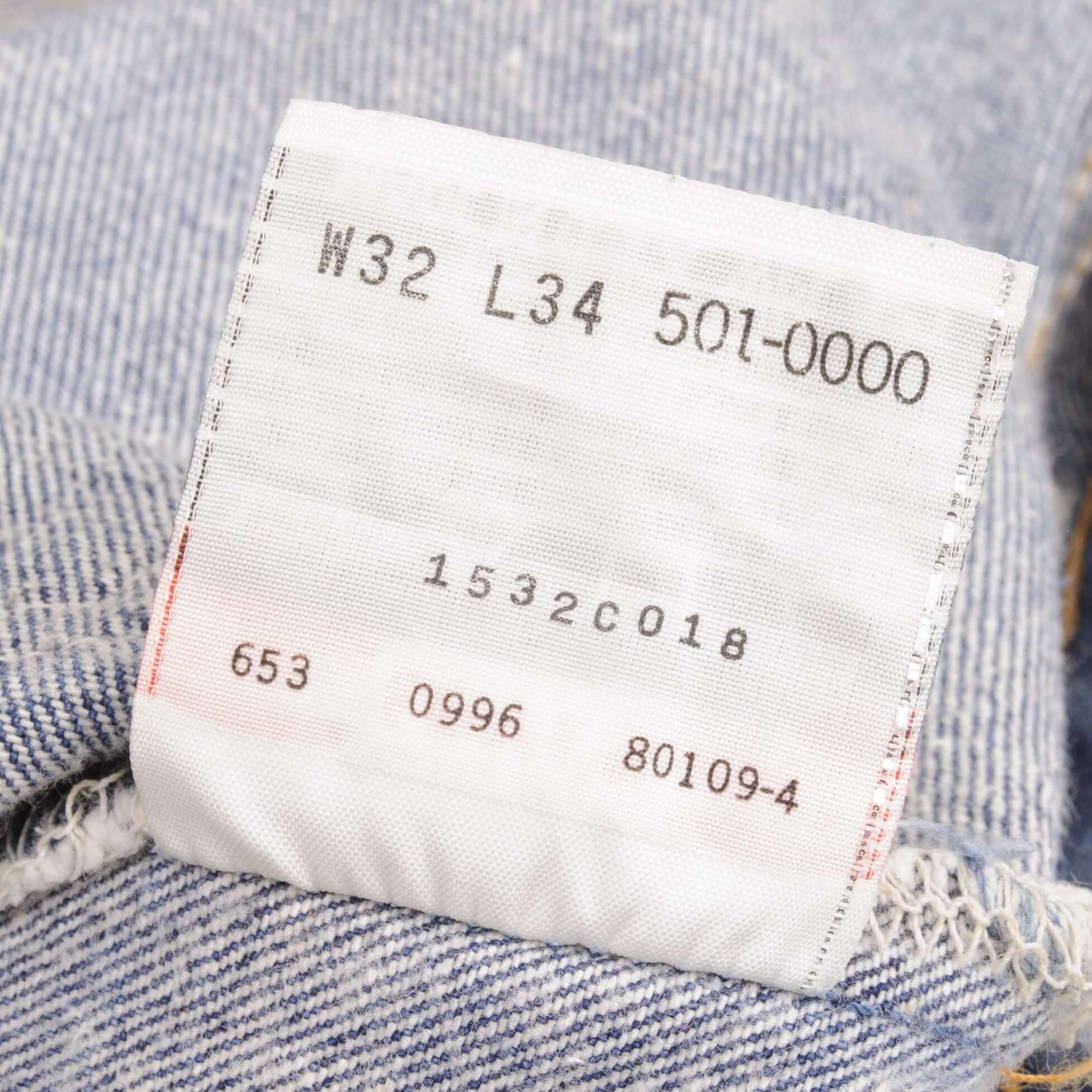 Beautiful Indigo Levis 501 Jeans Made in USA with dark wash with light whiskers  Size on Tag 32X34 Actual Size 32X32 Back Button #653