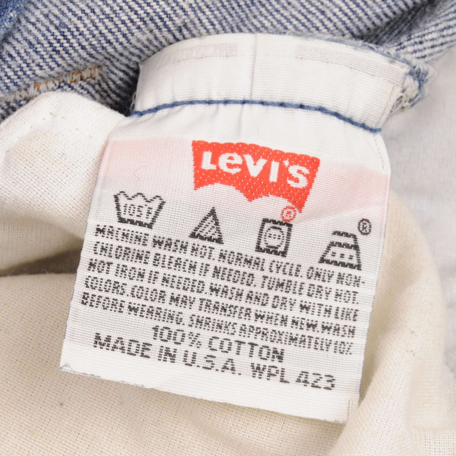 Beautiful Indigo Levis 501 Jeans 1990S Made in USA with very dark wash  Size on Tag 33X33 Actual Size 33X31 Back Button #524