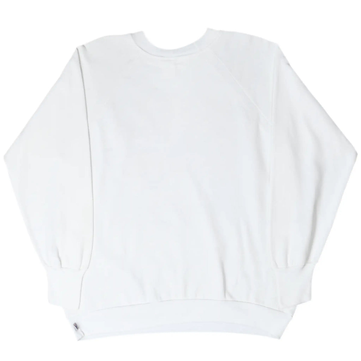 Plain back of white crewneck sweatshirt with raglan sleeves and ribbed cuffs and hem
