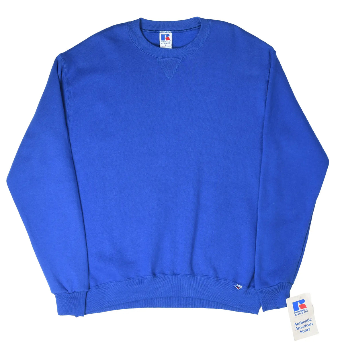 Full front view of blue Russell Athletic blank crewneck sweatshirt with hangtag