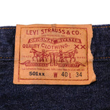 Beautiful Indigo Levis 501 Jeans 1990s Made in USA with a very dark wash.  Size on Tag 40X34  ACTUAL SIZE 38X31  Back Button #u53