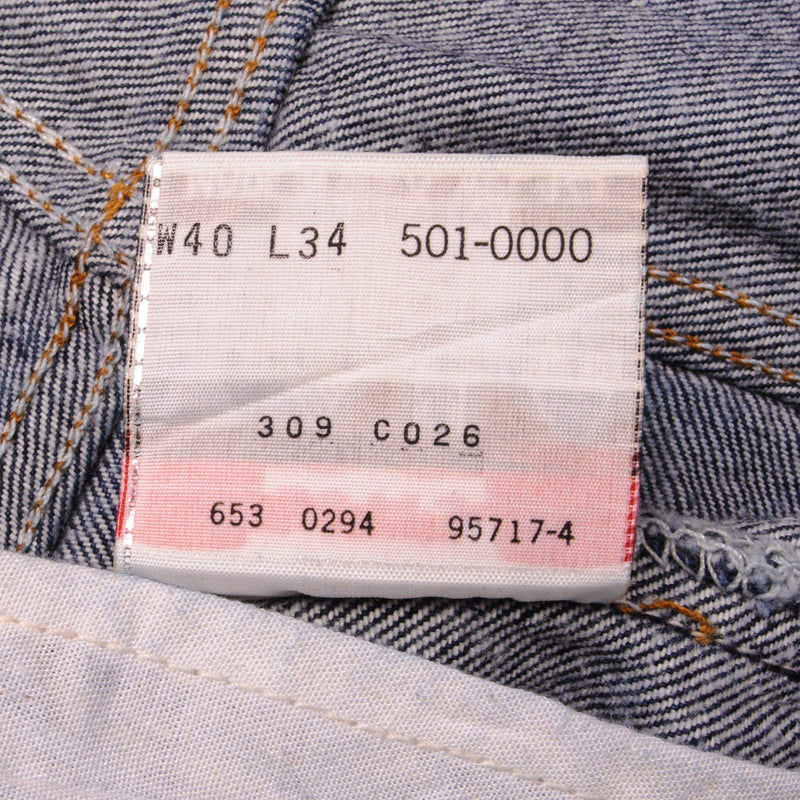 Beautiful Indigo Levis 501 Jeans 1990s Made in USA with a very dark wash.  Size on Tag 40X34  ACTUAL SIZE 38X31  Back Button #u53