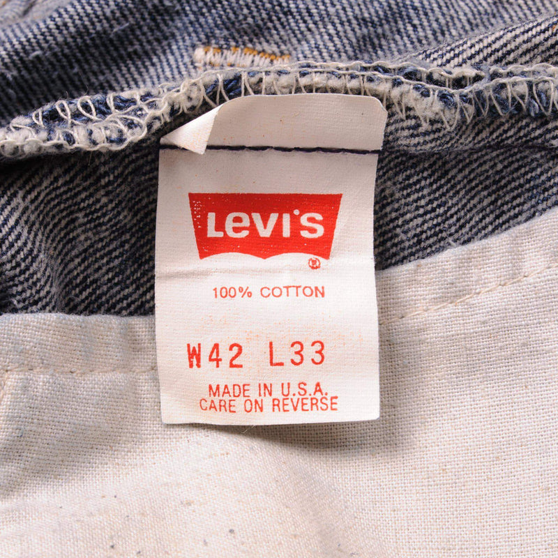 Beautiful Indigo Levis 501 Jeans 1988-1993 Made in USA with a very dark wash.  Size on Tag 42X33  ACTUAL SIZE 40X30  Back Button #532
