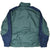 Back of green Nike windbreaker with navy shoulder and sleeve panels