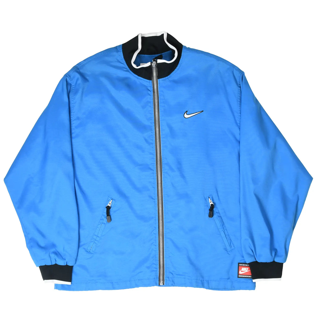Front view of blue Nike windbreaker jacket with white Swoosh embroidery and full zip