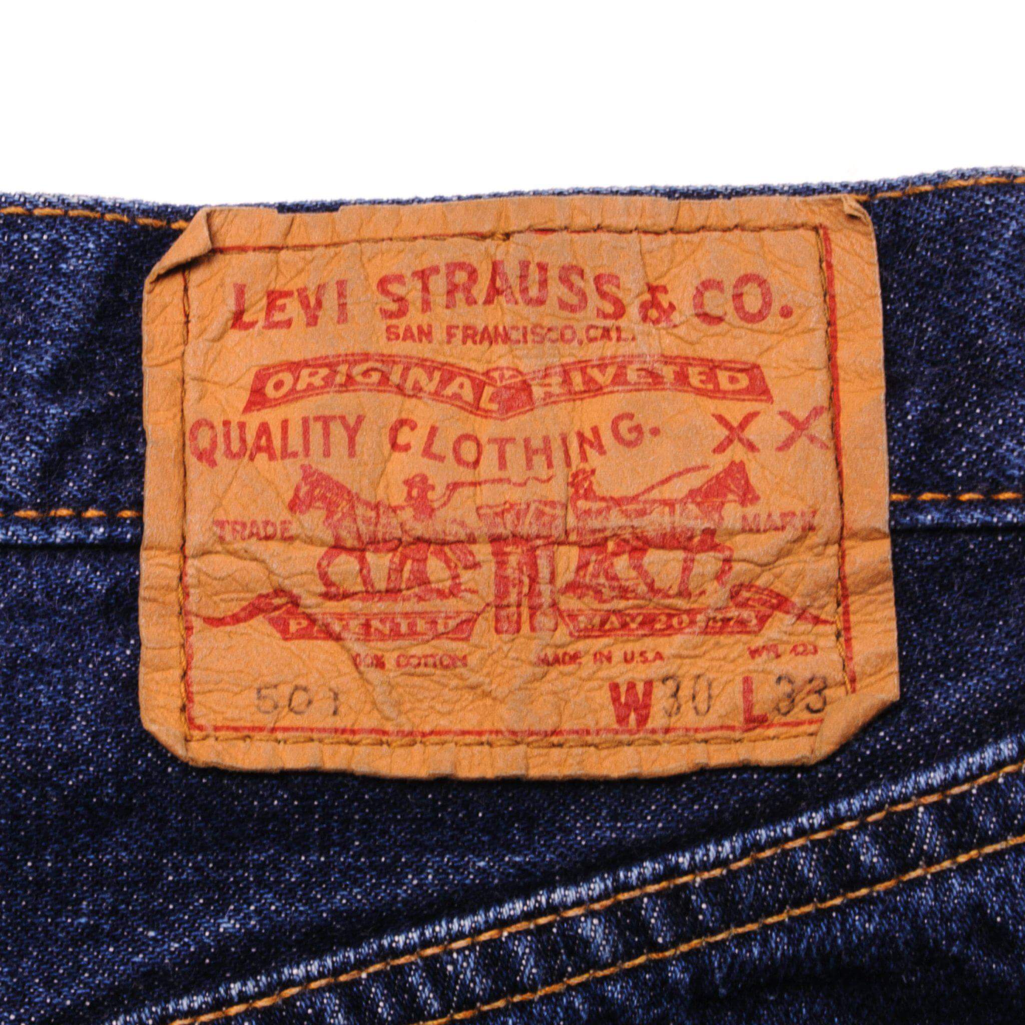 Beautiful Indigo Levis 501 Jeans with Selvedge and Single Stitch Pockets 1980s Made in USA with a medium blue wash and a nice contrast of light and medium blue.  Size on Tag 30X33  ACTUAL SIZE 28X30  Back Button #6