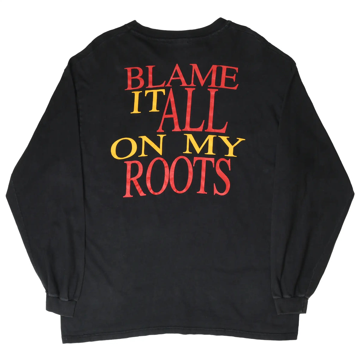 Back of black long-sleeve shirt with red and yellow Blame It All on My Roots print