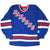 Full front of blue New York Rangers Starter jersey with diagonal team lettering