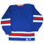 Back of blue New York Rangers Starter hockey jersey with red and white sleeve and hem stripes