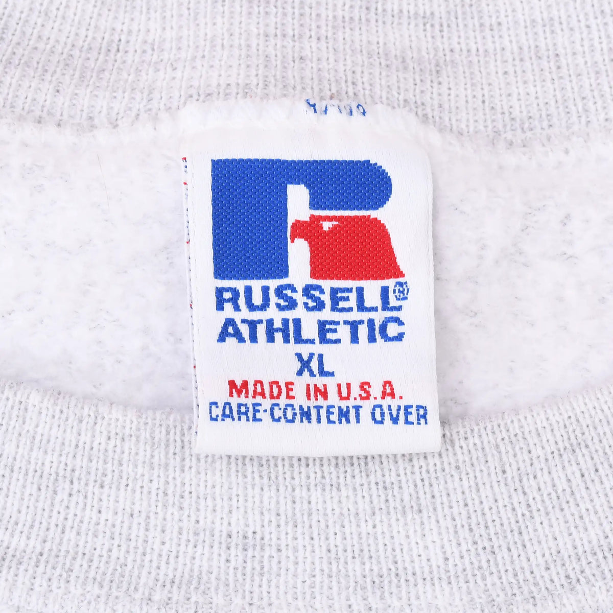 Russell Athletic XL neck label with Made in U.S.A. and care content over text