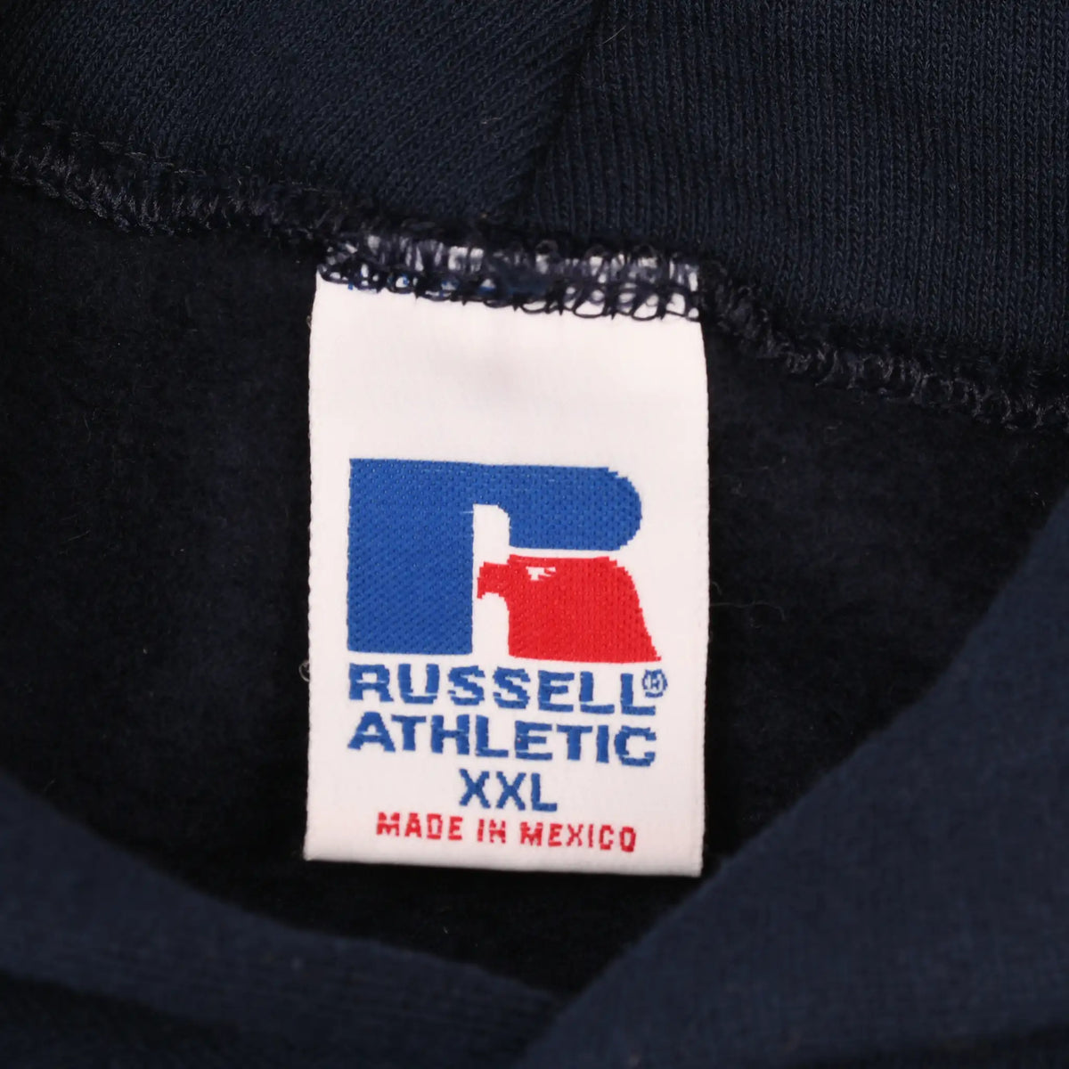 Russell Athletic neck tag marked XXL and Made in Mexico