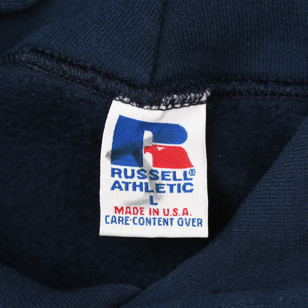 Russell Athletic size L Made in USA care-content tag inside navy hoodie