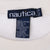 Close-up of Nautica neck and care labels with XL/TG size marking