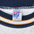 Close-up of Great Games large tag inside the navy, white, and maize striped collar